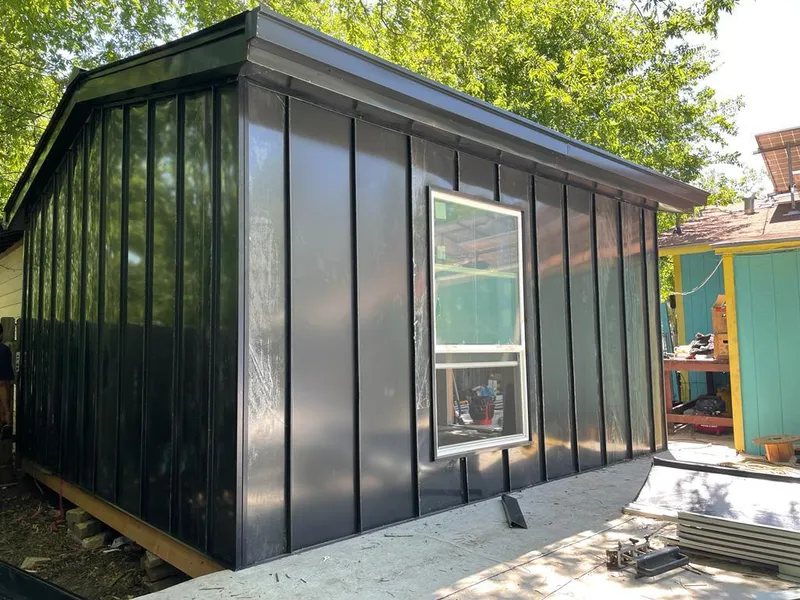 Black standing seam metal wall panels for Metal Roof Installation in Green Lake