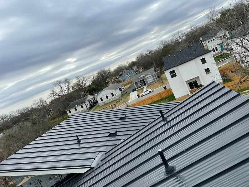 Standing seam metal roof panels with vents for Skylight Repair in Green Lake